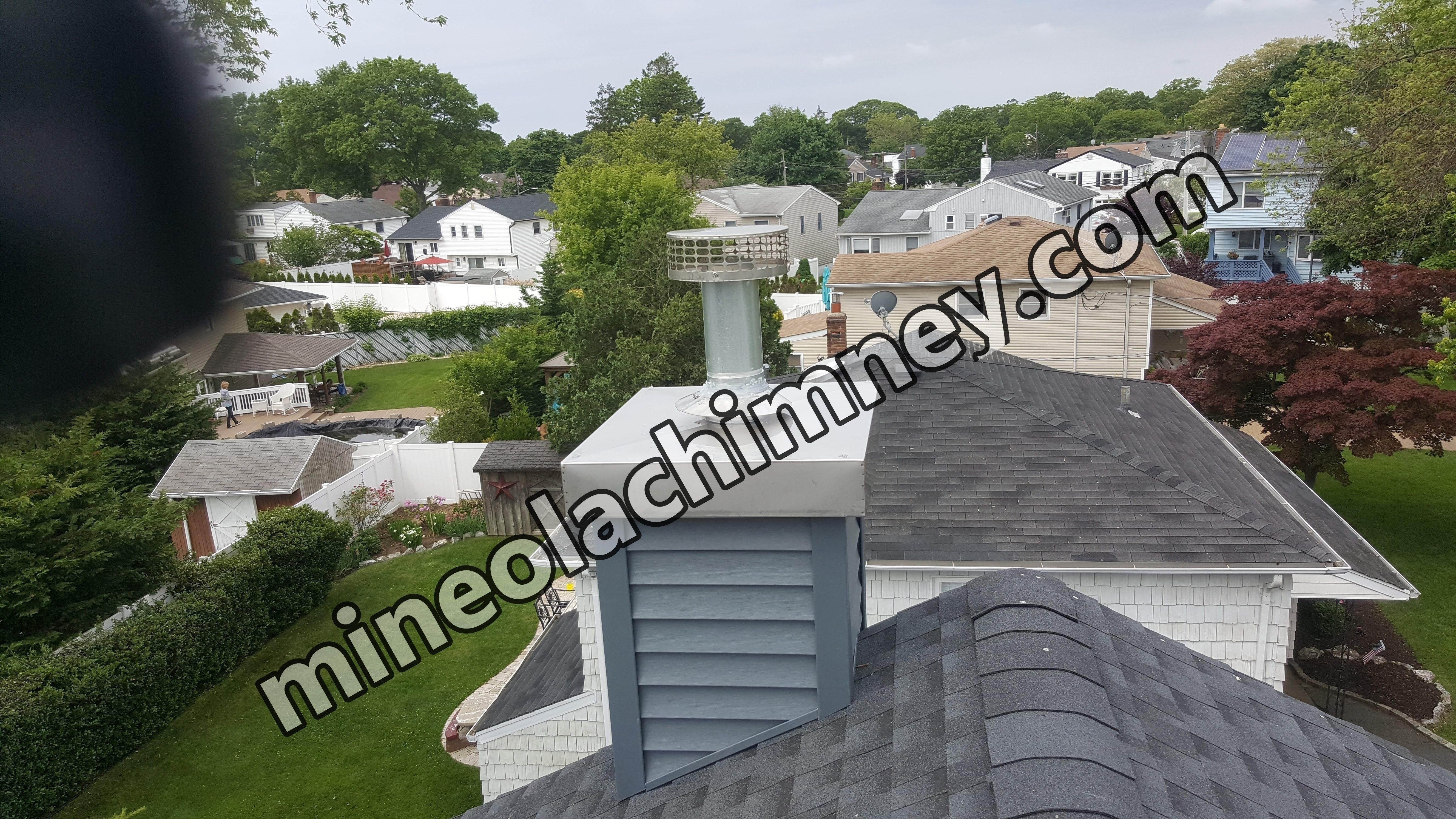 Complete chimney crown rebuild and waterproofing in Mineola, New York