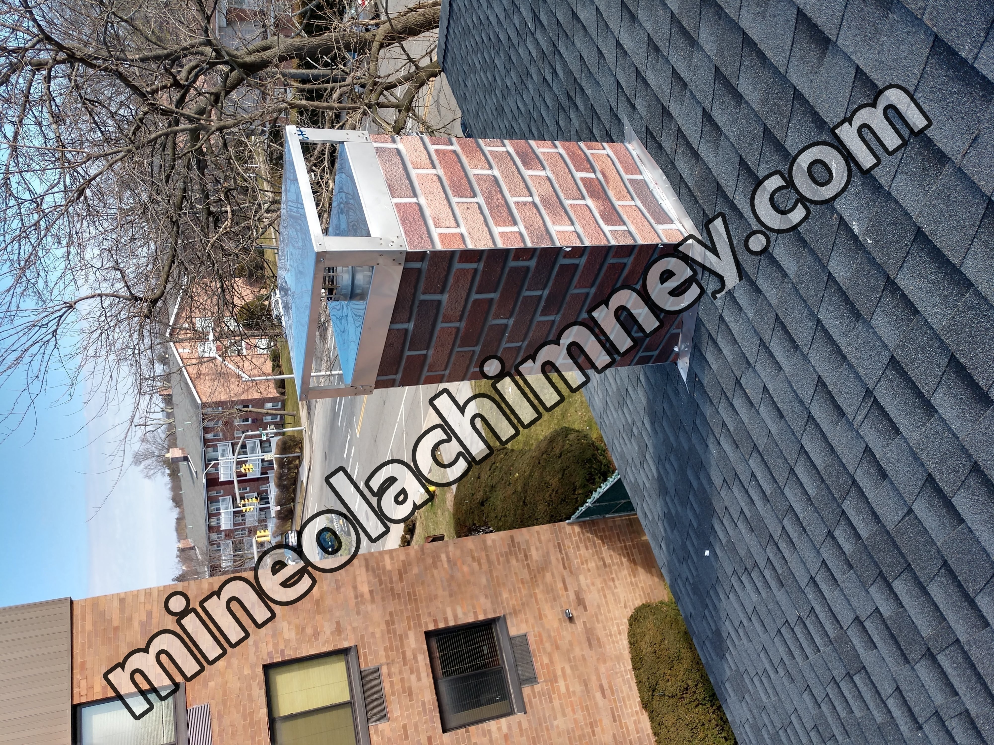 New elastomeric sealant applied to chimney crown in Mineola, NY