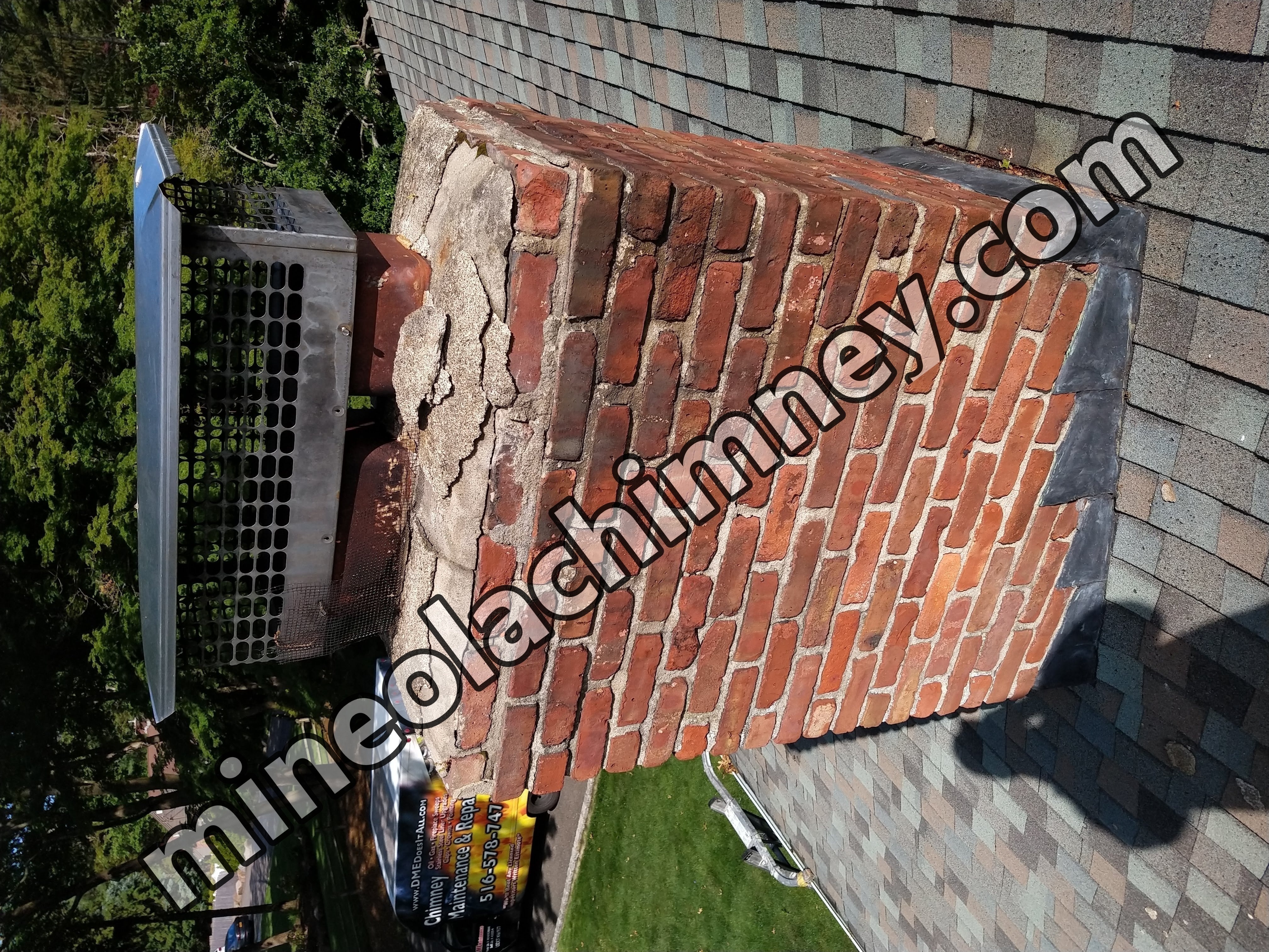 Cracked chimney crown professionally repaired in Mineola, New York