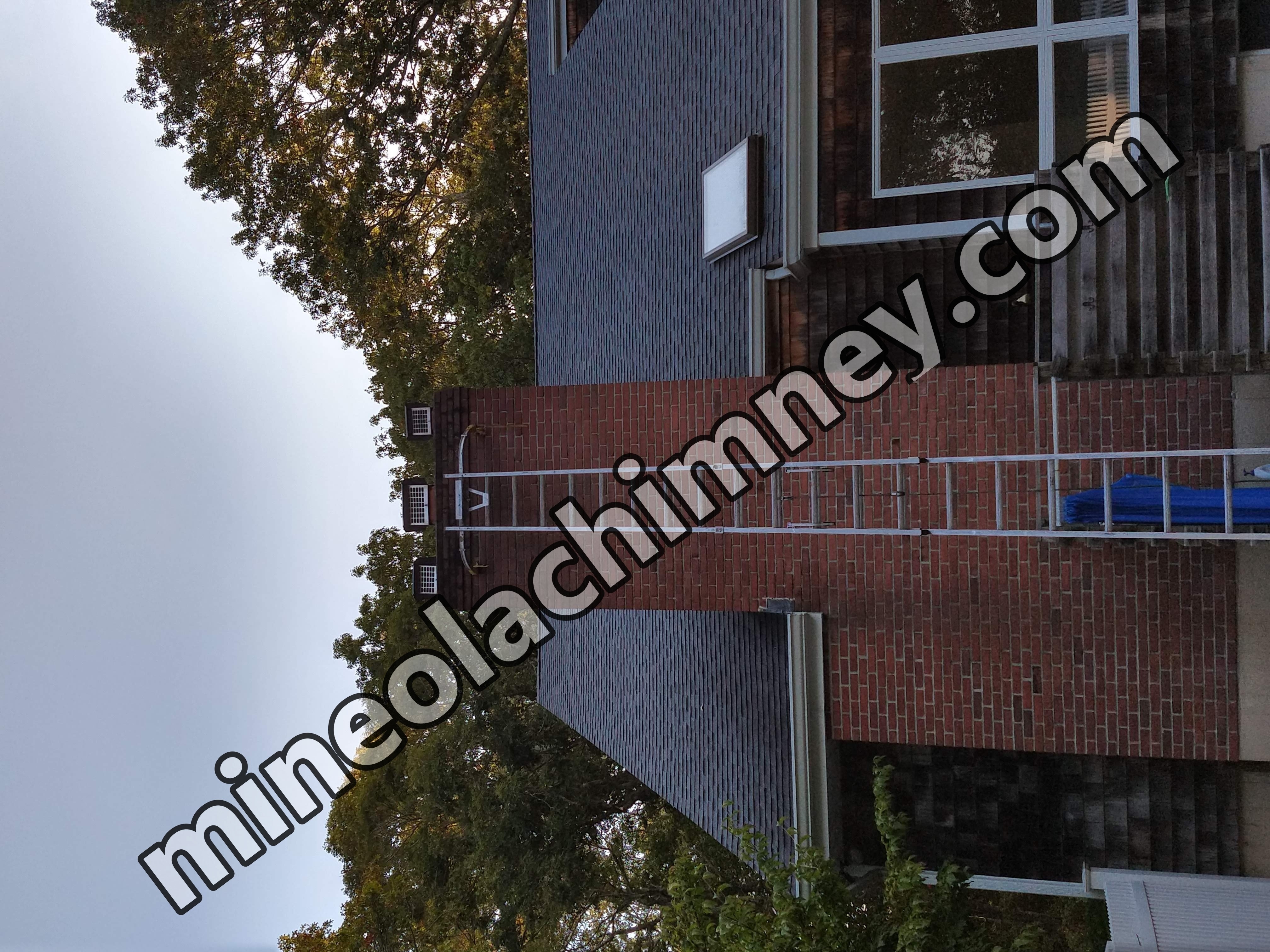 Draft-reducing chimney damper fixing heat loss in Mineola, NY
